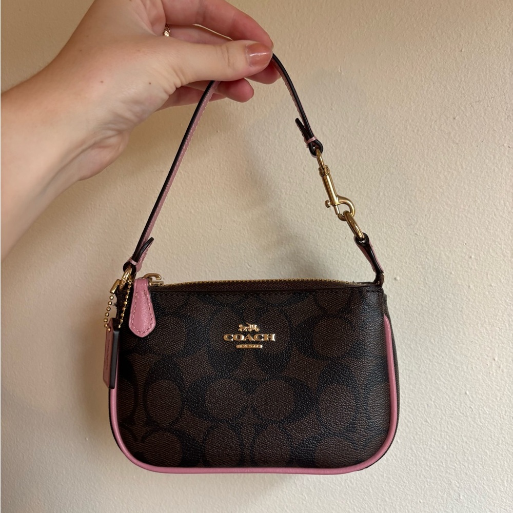 Coach Nolita 15 in Signature Canvas with True Pink trim (Style C4580)